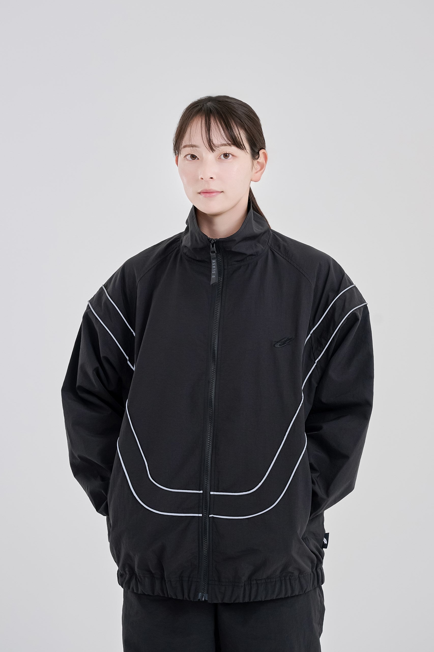 Reflective woven track jacket – U SLASH