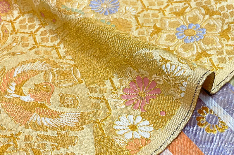 金襴生地販売 花亀甲鳳凰文 (桑染)柄の和柄生地通販なら都香庵