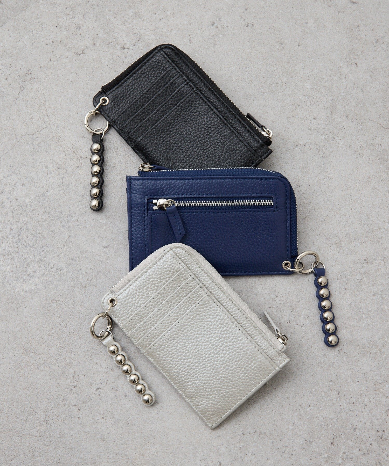 ear PAPILLONNER｜【ほし企画】本革スタッズフラグメントケース