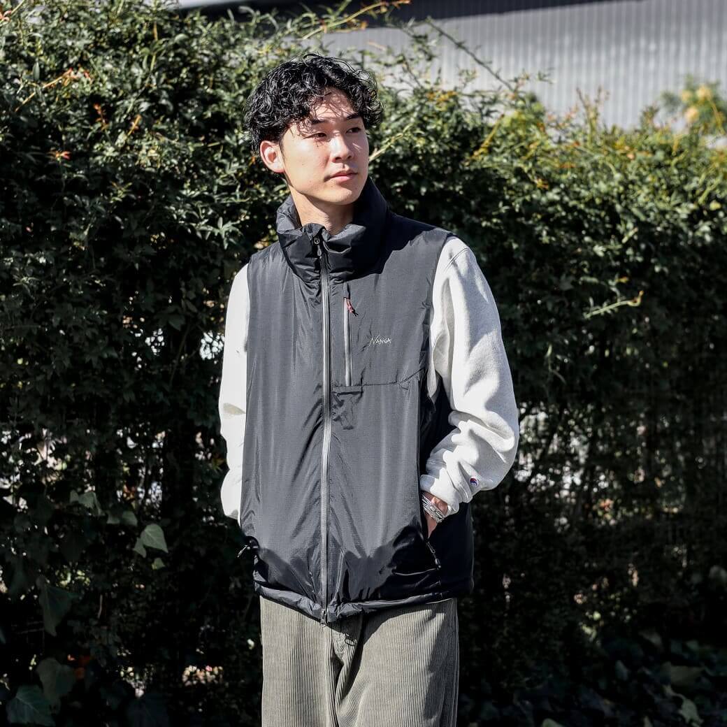 NANGA ナンガ オーロラテックススタンドカラーダウンベスト｜BORN FREE