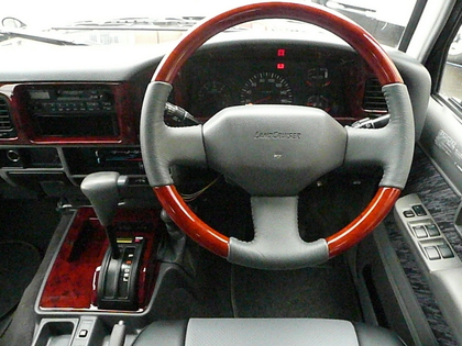 78プラドのウッドステアリング＆パネルにドリンクホルダー付き肘掛を