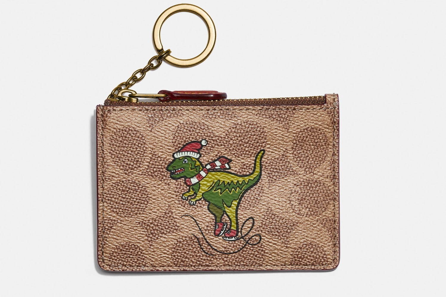 コーチ2020年冬のおすすめギフト、“スケート姿”の恐竜レキシー柄レザー