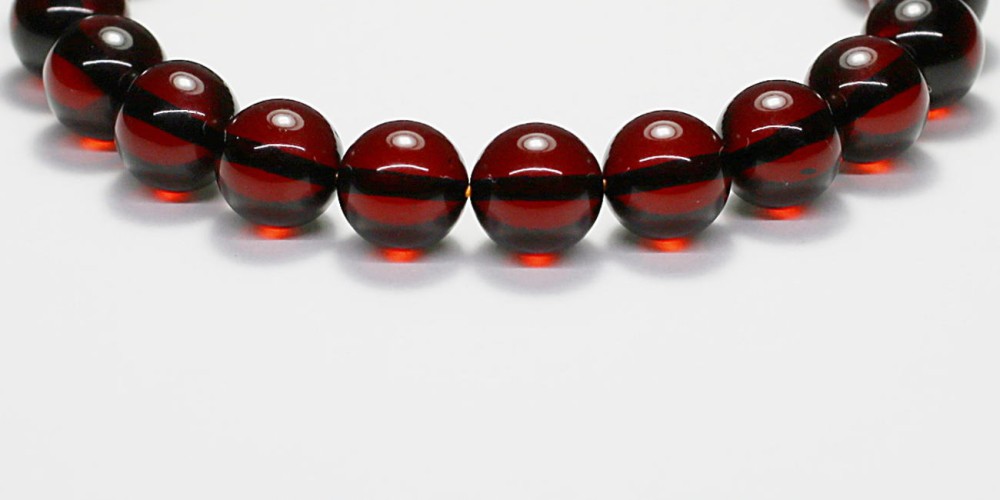 高品質]天然レッドアンバーブレスレット（約9.5mm玉・熱処理・鑑別書