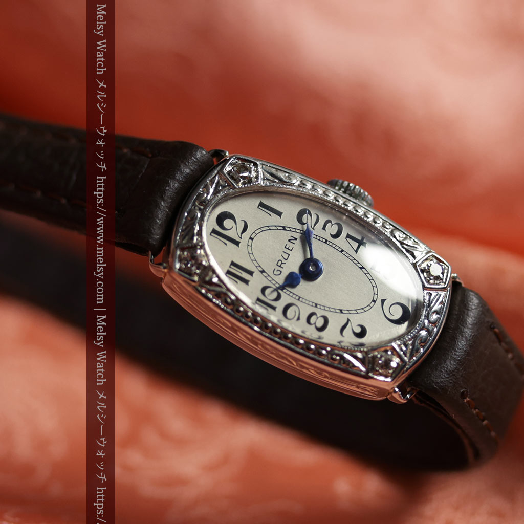 グリュエンの品のある楕円形とダイヤ装飾の金無垢アンティーク腕時計