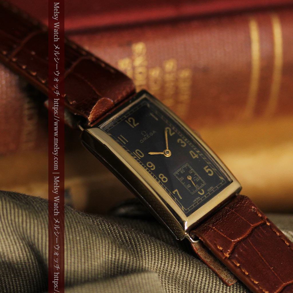 オメガのシックな黒色文字盤 品ある縦長アンティーク腕時計 【1940年製】
