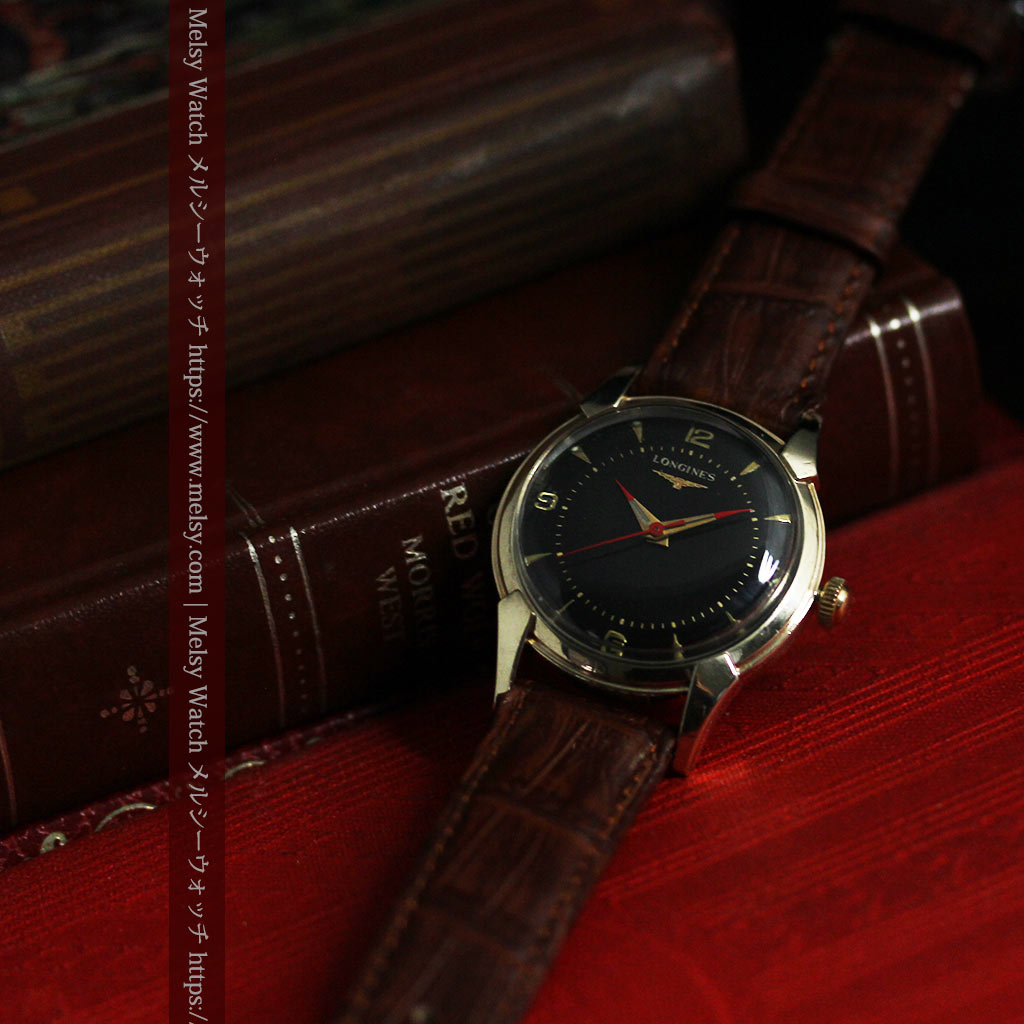 ロンジンのアンティーク腕時計 黒い文字盤に赤のエッセンス
