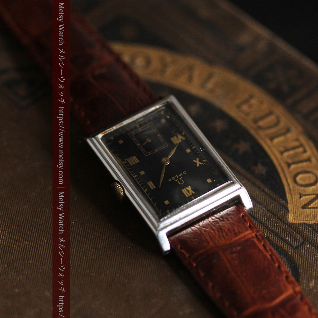 オメガ アンティーク腕時計 上品な黒と金のコントラスト 【1943年製】