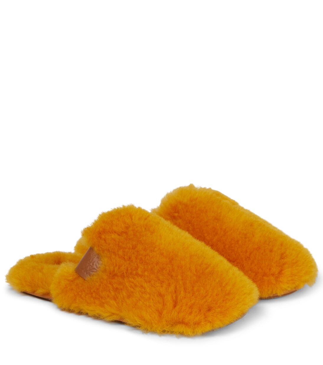 Logo-patch shearling slippers in orange - Loewe | Mytheresa