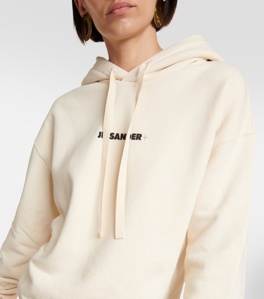 Logo cotton jersey hoodie in white - Jil Sander | Mytheresa