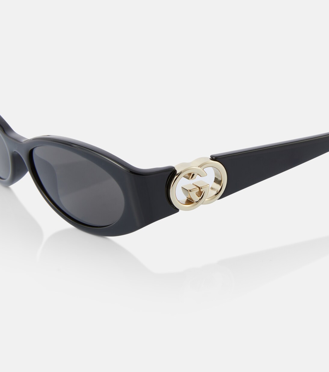 Interlocking G oval sunglasses in black - Gucci | Mytheresa