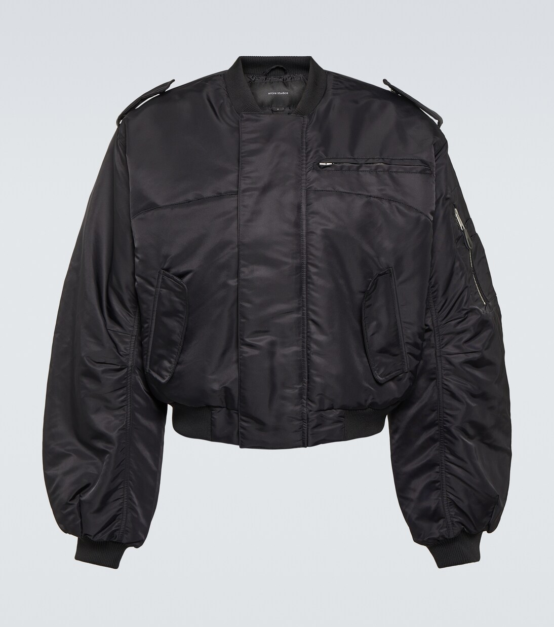 Padded varsity jacket in black - Entire Studios | Mytheresa