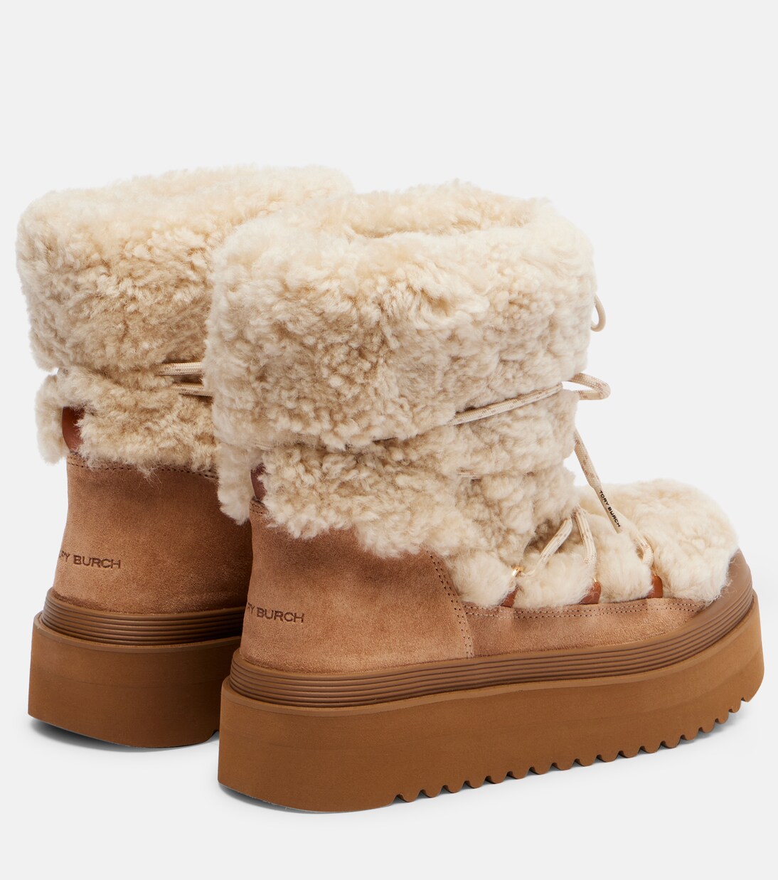 Mellow shearling and suede lace-up boots in beige - Tory Burch