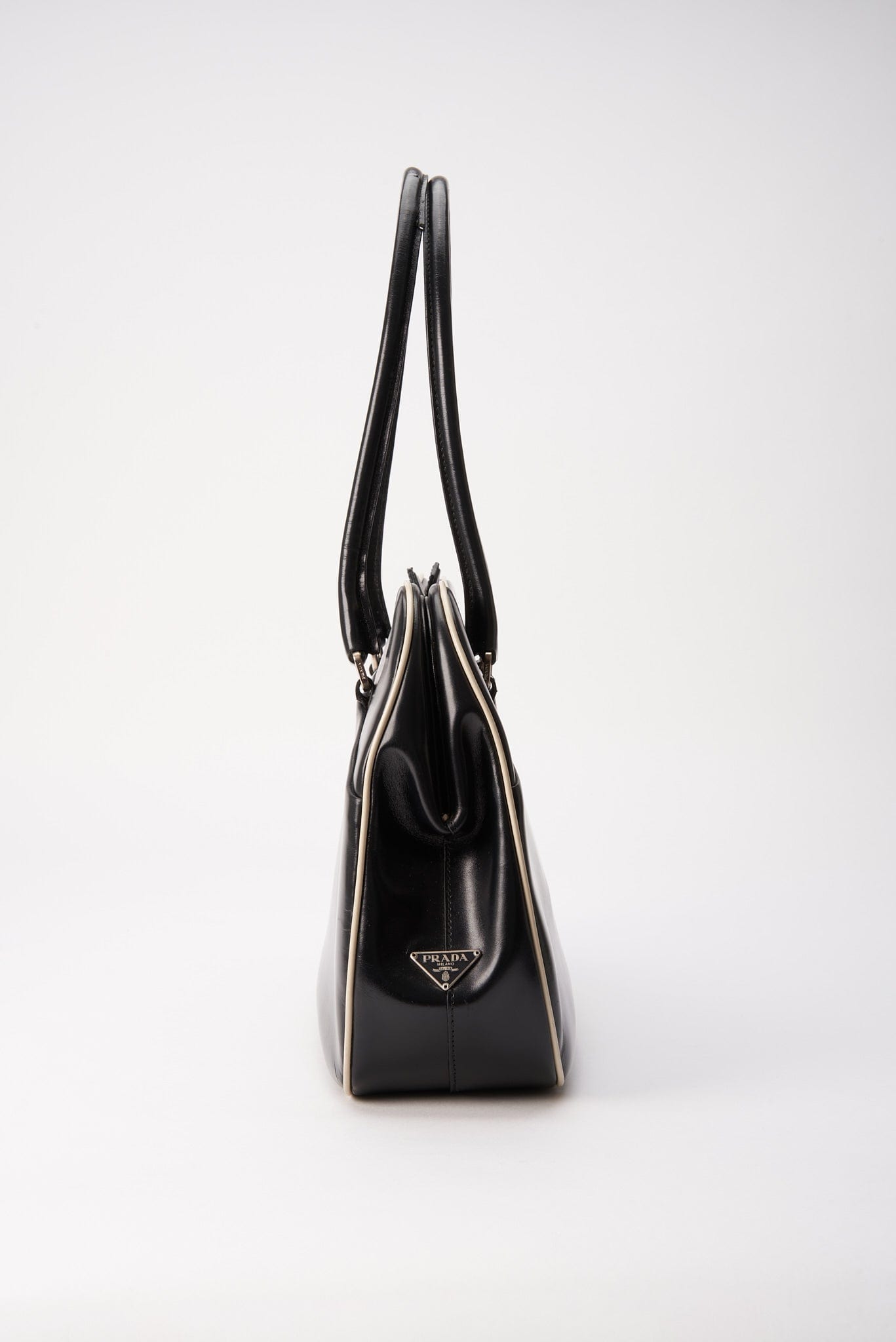 A vintage 90's Prada Black Leather Shoulder Bag – The Hosta