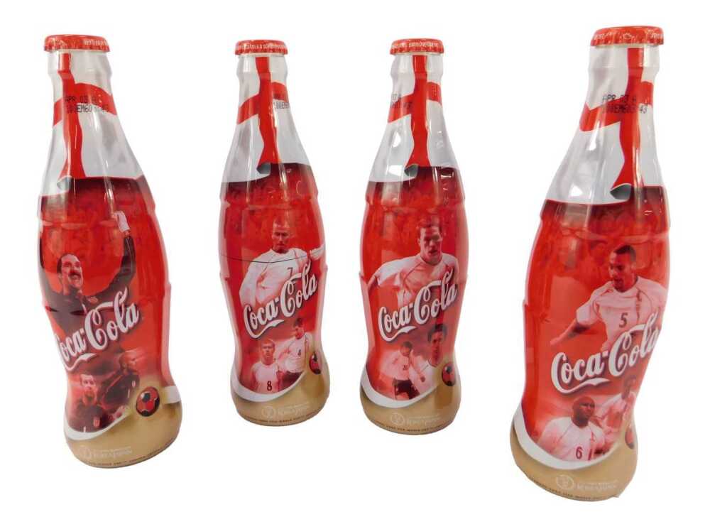 Four commemorative Coca-Cola bottles, for 2002 FIFA World Cup