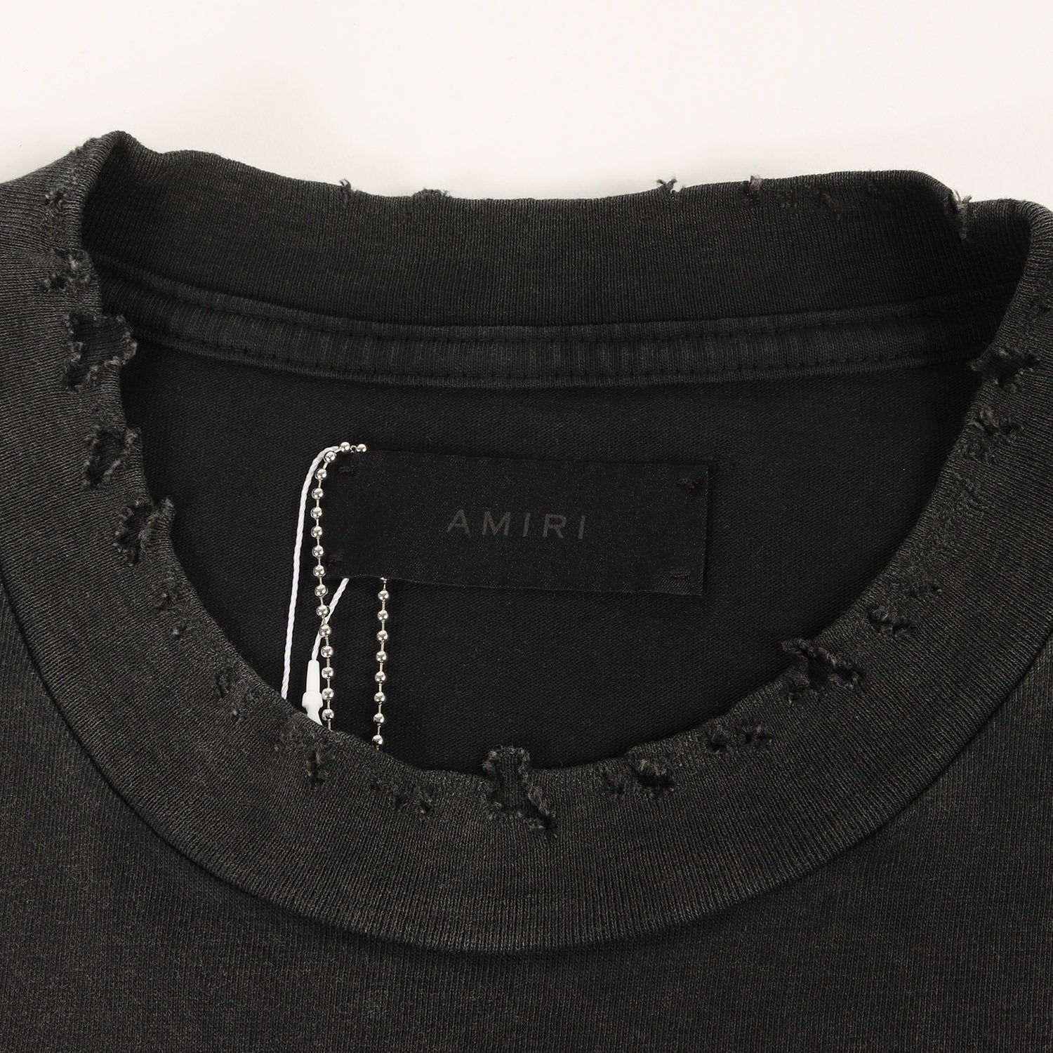 AMIRI (アミリ) 25SS ヴィンテージ加工 ラインストーン ロゴ Tシャツ
