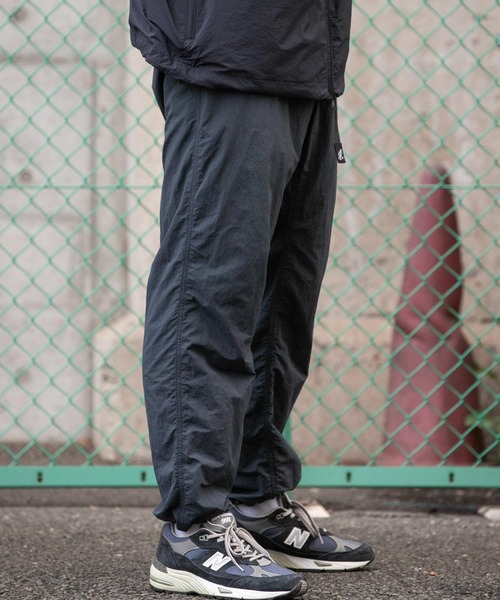 Gramicci（グラミチ）の「LOWERCASE / GRAMICCI NYLON TRACK PANTS