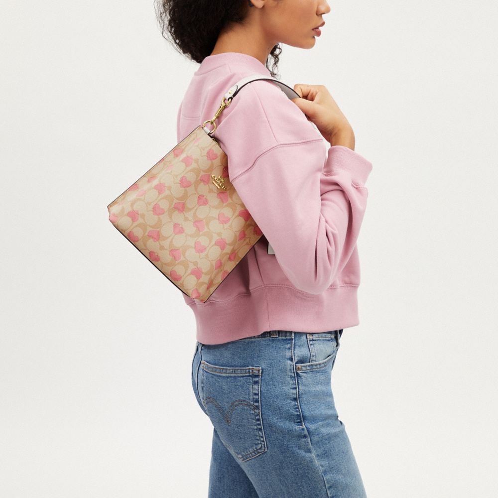 公式】コーチアウトレット | モリー バケット バッグ 22・シグネチャー