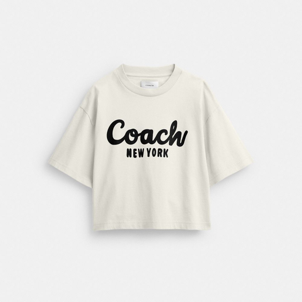 公式】COACH – コーチ | カーシヴ シグネチャー クロップド Tシャツ
