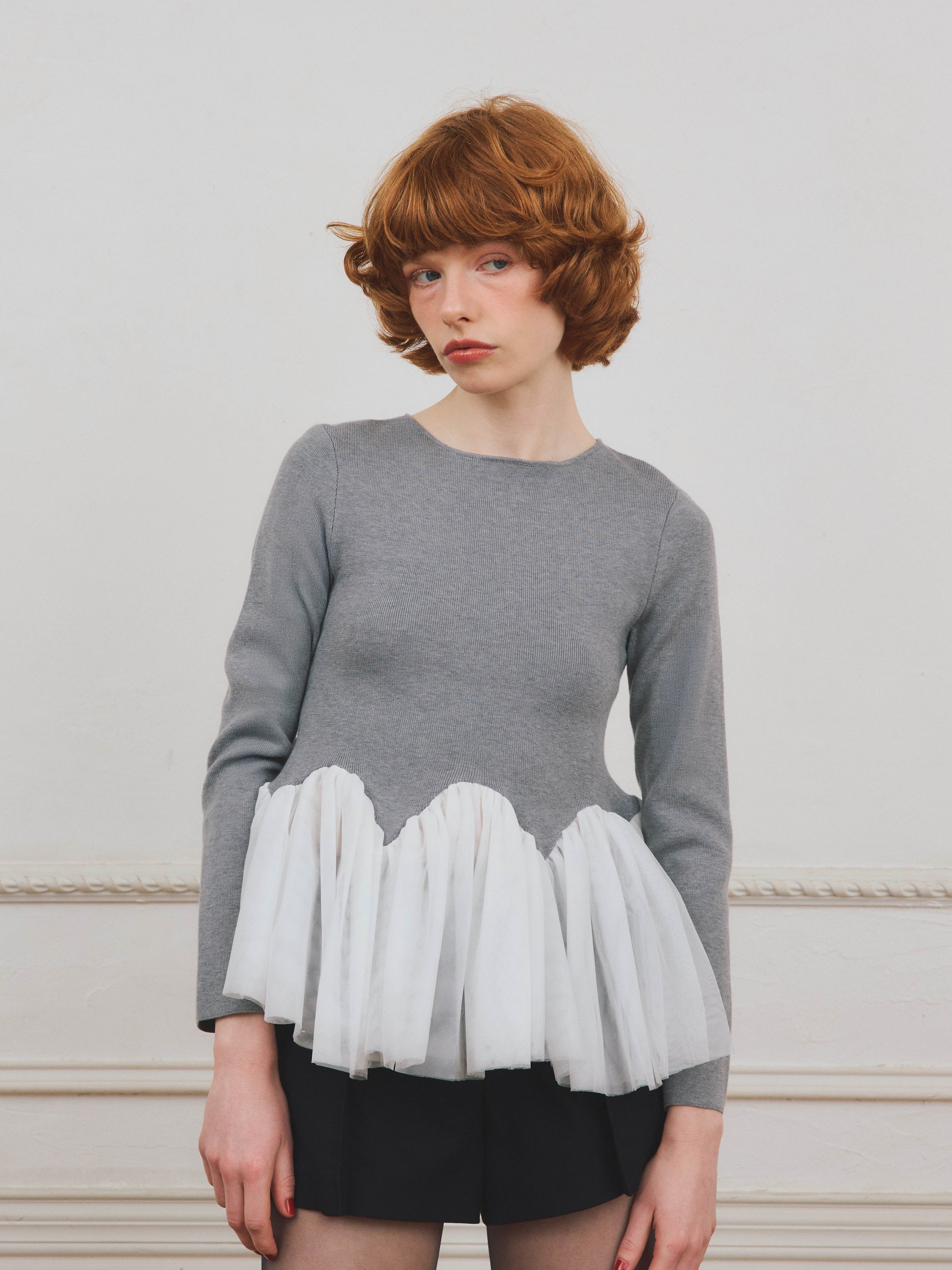 チュールペプラムニットプルオーバー