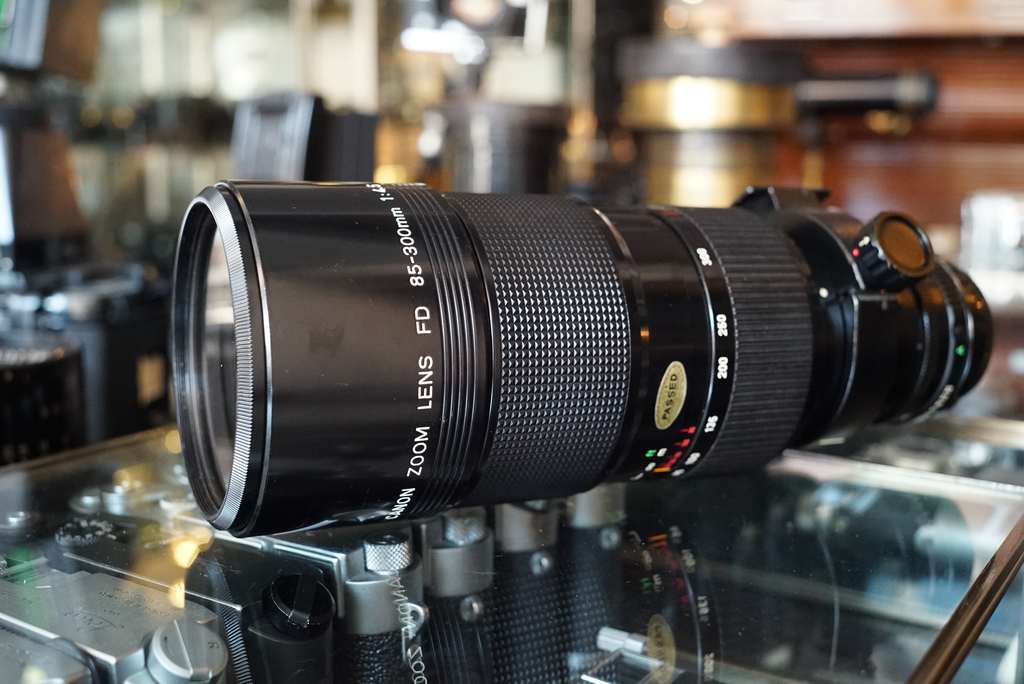 Canon zoom lens FD 85-300mm 1:4.5 - Fotohandel Delfshaven / MK Optics