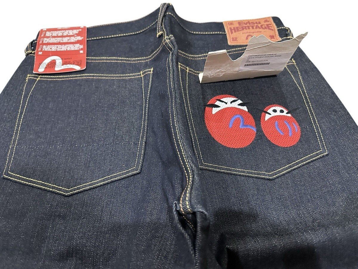 Vtg Evisu seldvage heritage denim with Japanese embroidered anime