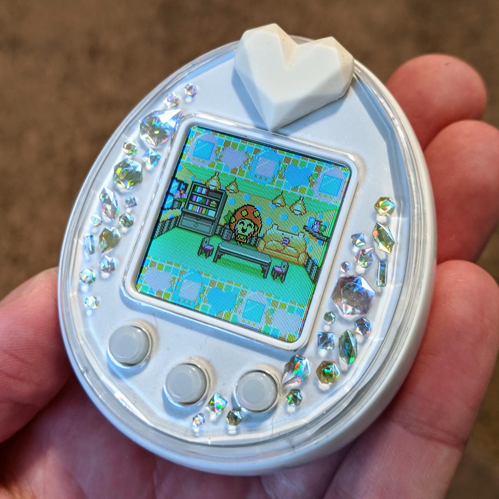 A new item in the collection, a white P's! : r/tamagotchi