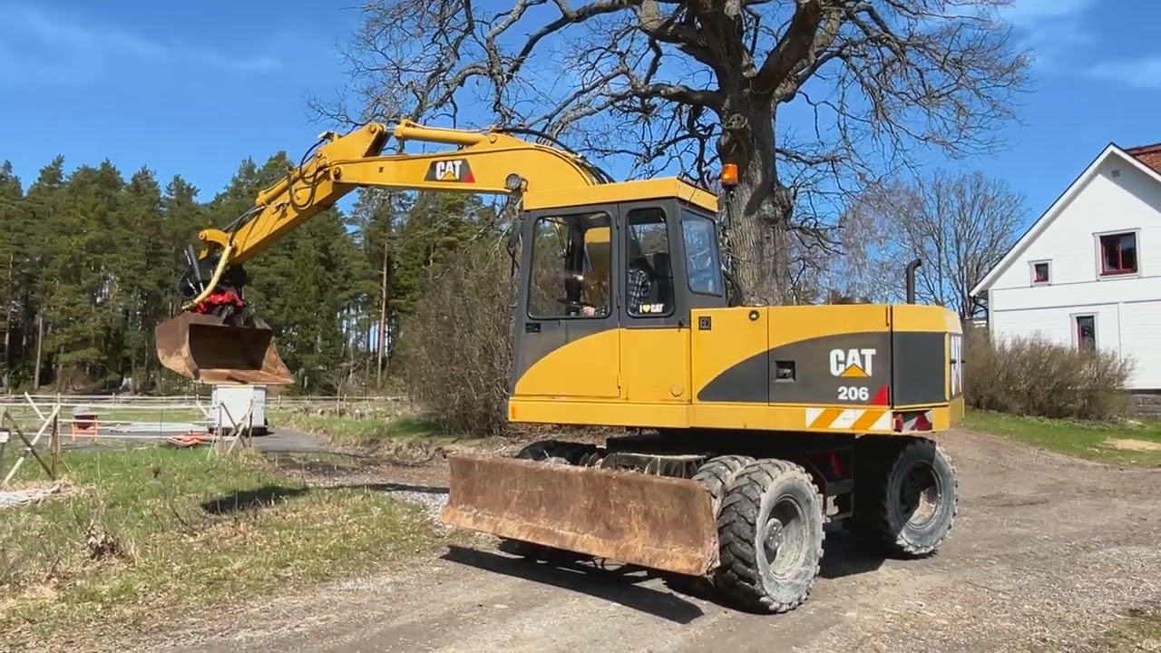 Caterpillar 206 - YouTube