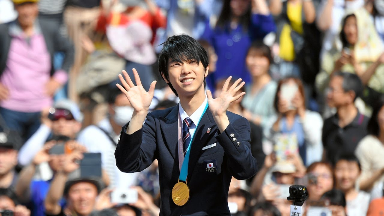 Gold medalist Hanyu returns home to massive parade in Sendai - YouTube