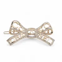 シャネル ココマーク リボン メタル×ラインストーン ピアス(両耳用