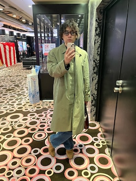 BURBERRYのステンカラーコート（グリーン系）を使った人気ファッション