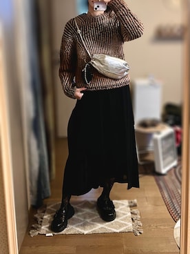 BLACK COMME des GARCONSのスカートを使った人気ファッション