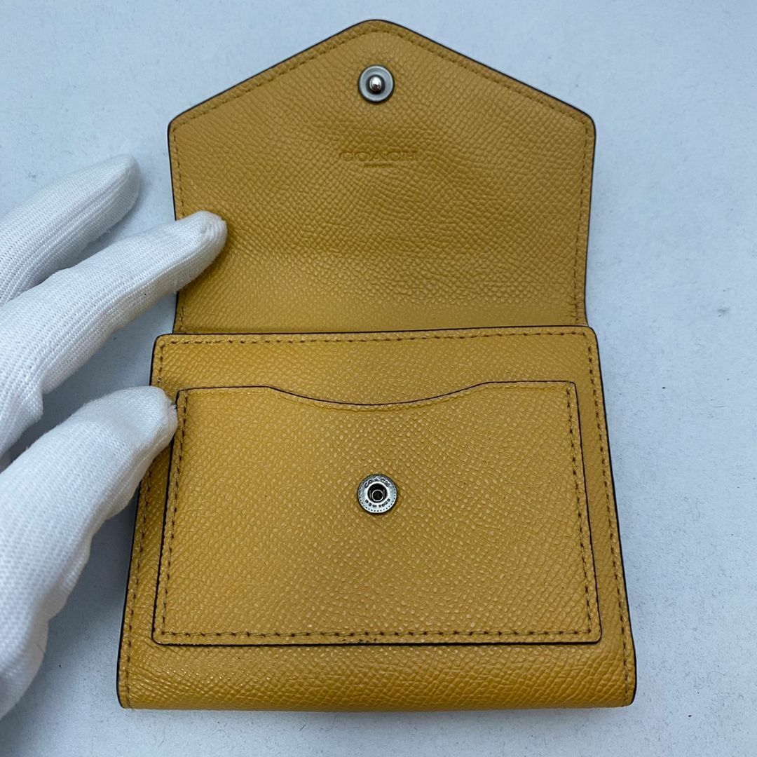COACH - 二つ折り財布 COACH イエロー コーチ 黄色 レザーの通販 by