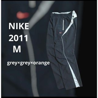 NIKE - 【新品未使用】NIKE SOLO SWOOSH フリースパンツ Lサイズの通販