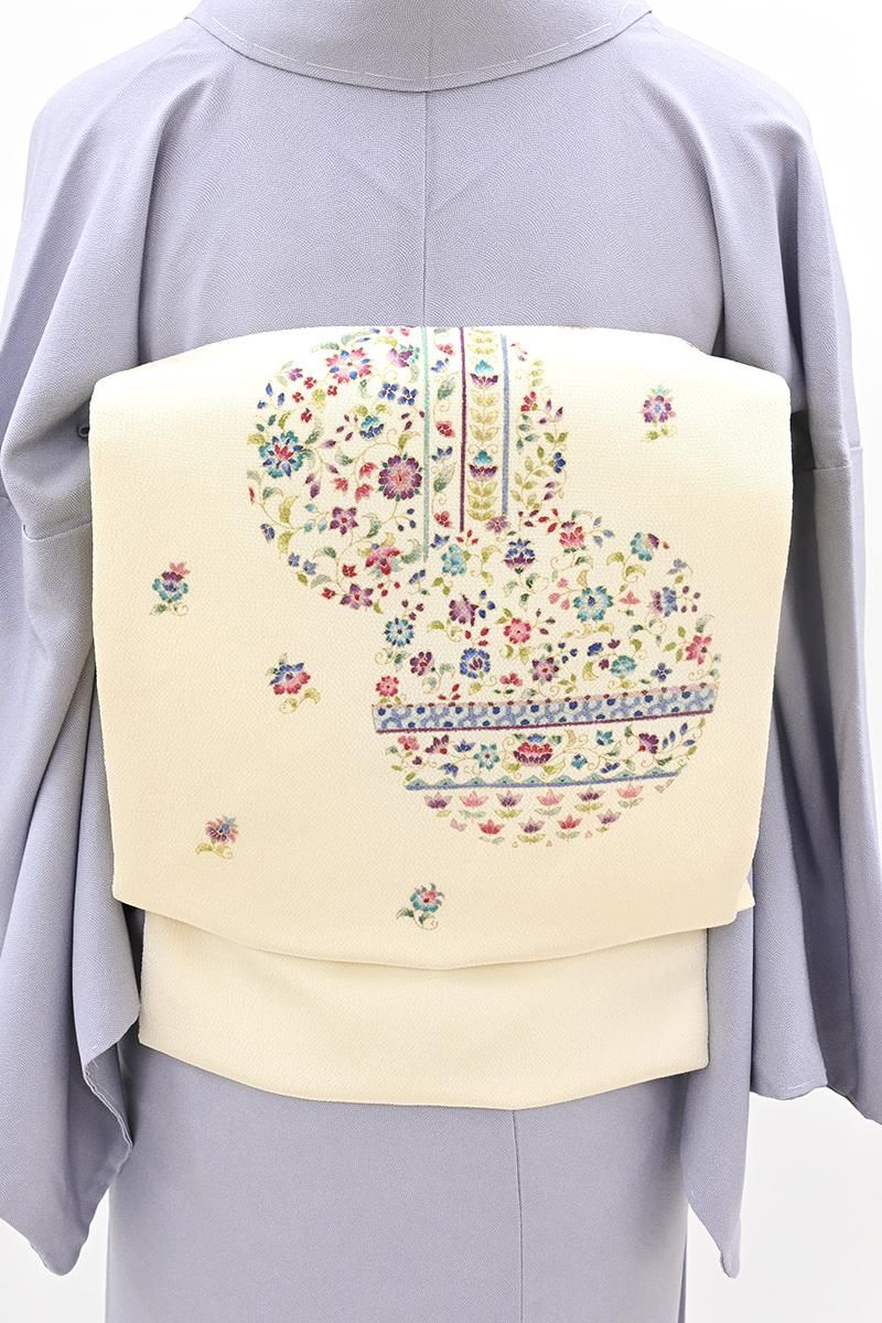 銀座【H-0816】岡重製 縮緬地 染名古屋帯 乳白色 更紗花文の丸（反端付