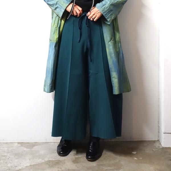 SHINYAKOZUKA(シンヤコズカ)/KNITTED PANTALON/POOL GREEN 通販