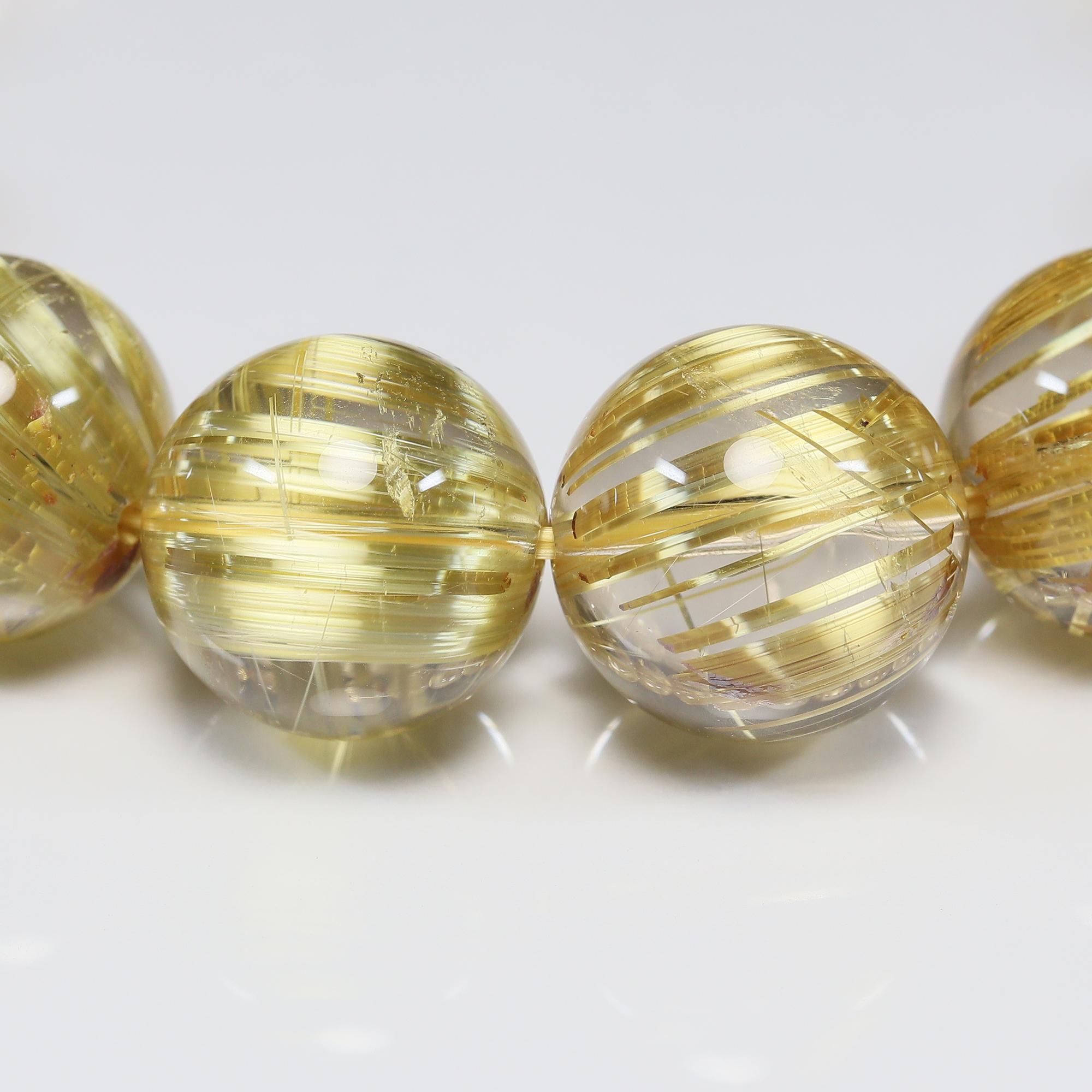 プレミアム タイチンイエローゴールドルチルクォーツ(キャッツアイ効果