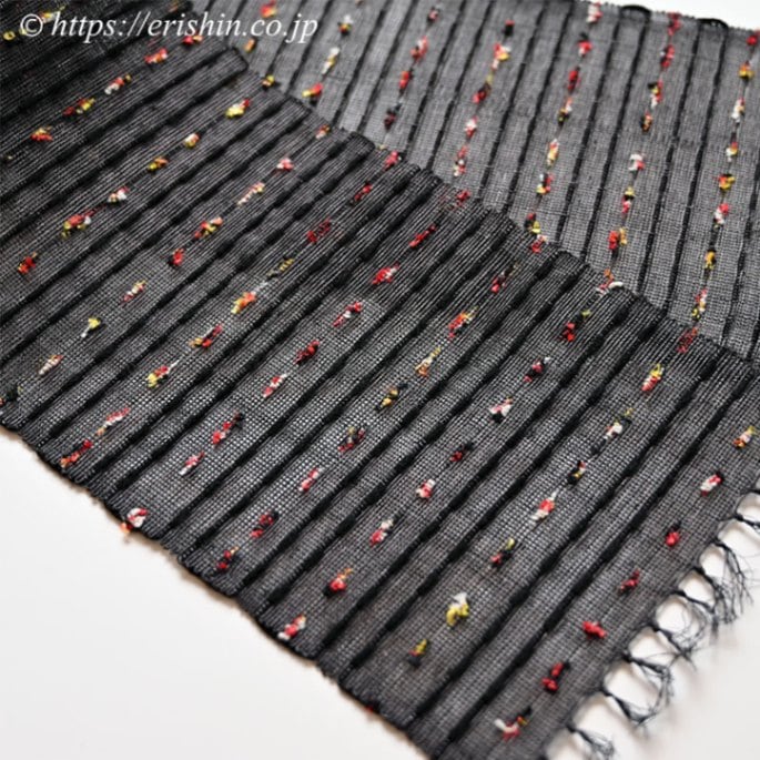 誉田屋源兵衛 半幅帯（芭蕉段織/黒橡・赤黄白ネップ）誉田屋源兵衛