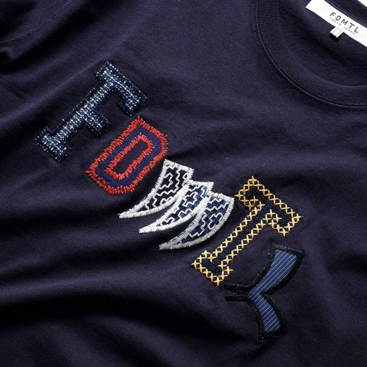 FDMTL(ファンダメンタル)/PATCHWORK LOGO TEE Tシャツ(FA24TE14) -24SS