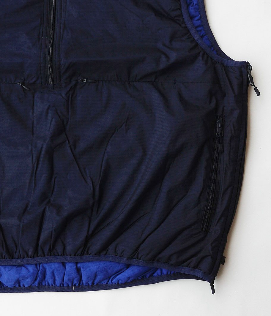 DAIWA PIER 39 TECH REVERSIBLE PULLOVER PUFF VEST [DARK NAVY