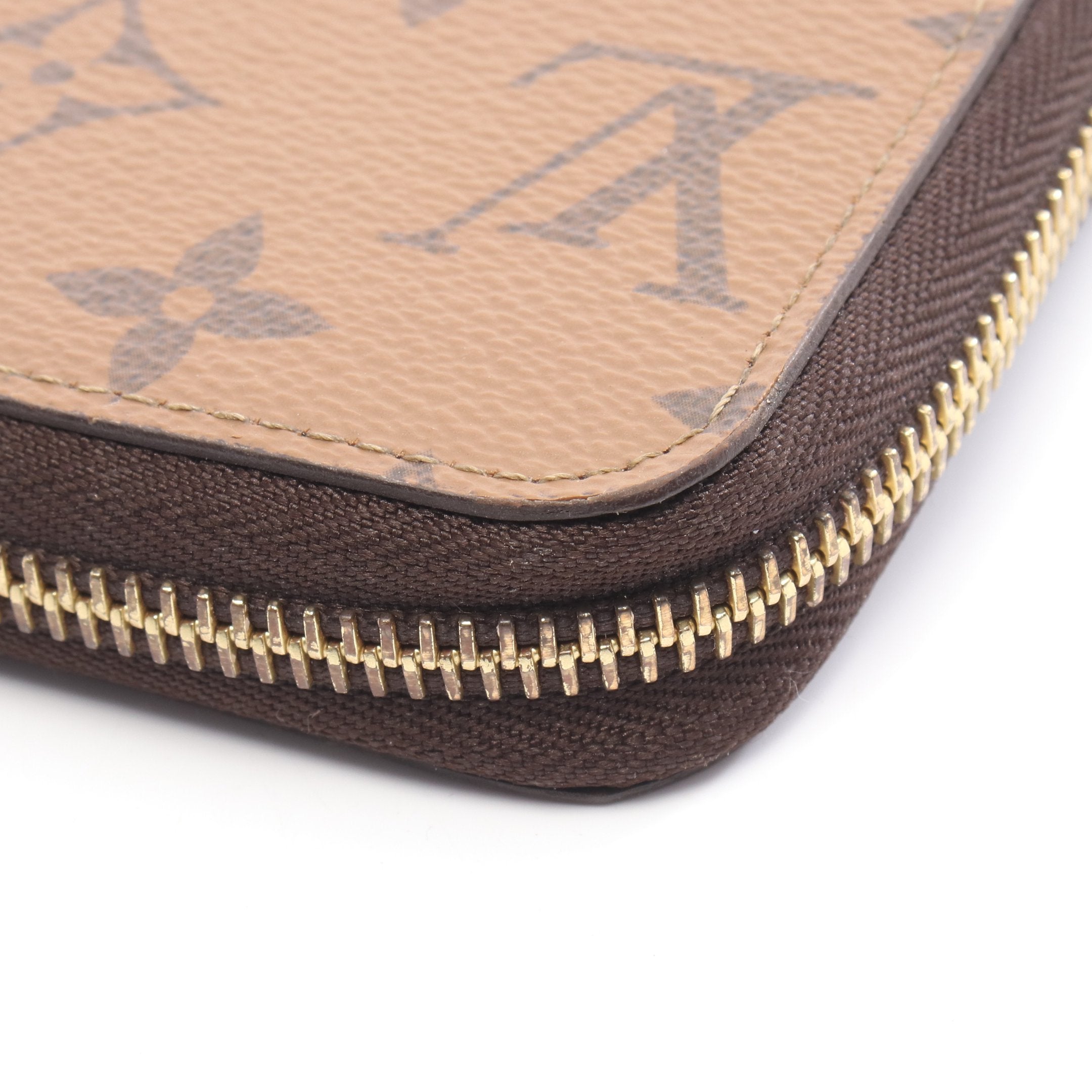 ジッピーウォレット モノグラムリバース ラウンドファスナー長財布 PVC