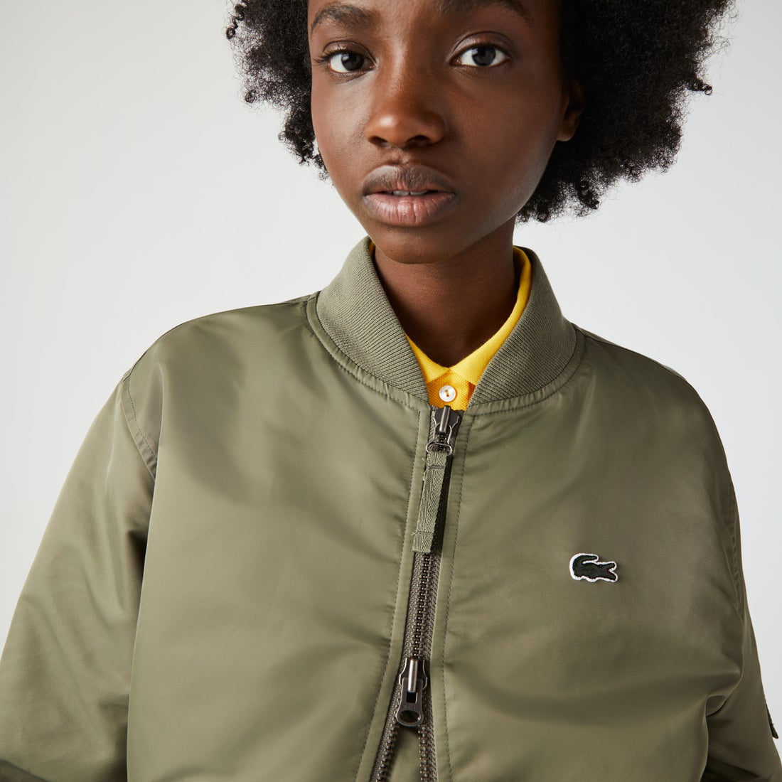 ラコステ LACOSTE LACOSTE L!VE ユニセックス フェルトロゴMA-1