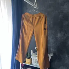 2026年最新】needles トラックパンツ マスタードの人気アイテム - メルカリ