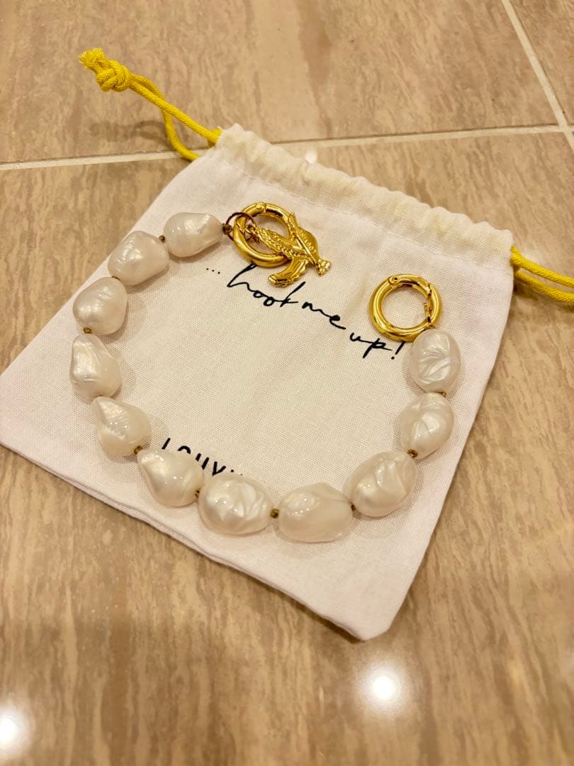 LOUVINI PARIS】ハンドストラップ⭐︎PETIT ROMY PEARL - メルカリ