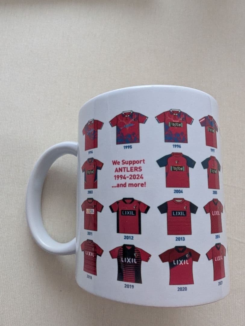 鹿島アントラーズ×LIXIL協賛30周年記念マグカップ&タオル - メルカリ