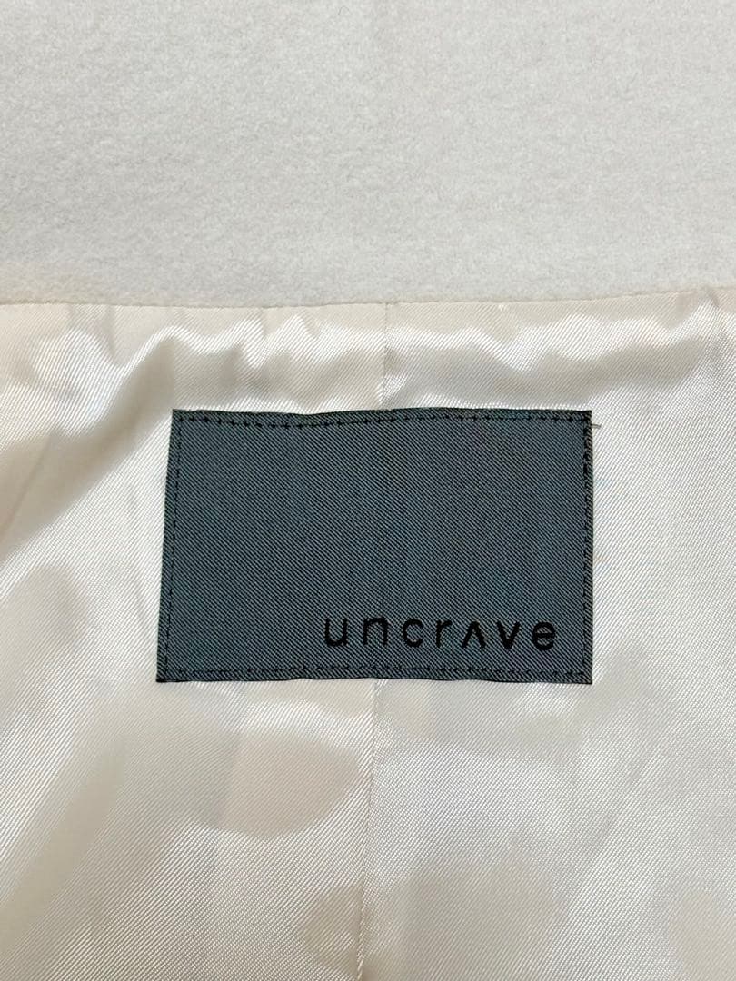 新品未使用】uncrave スタンドネックコート アイボリー - メルカリ
