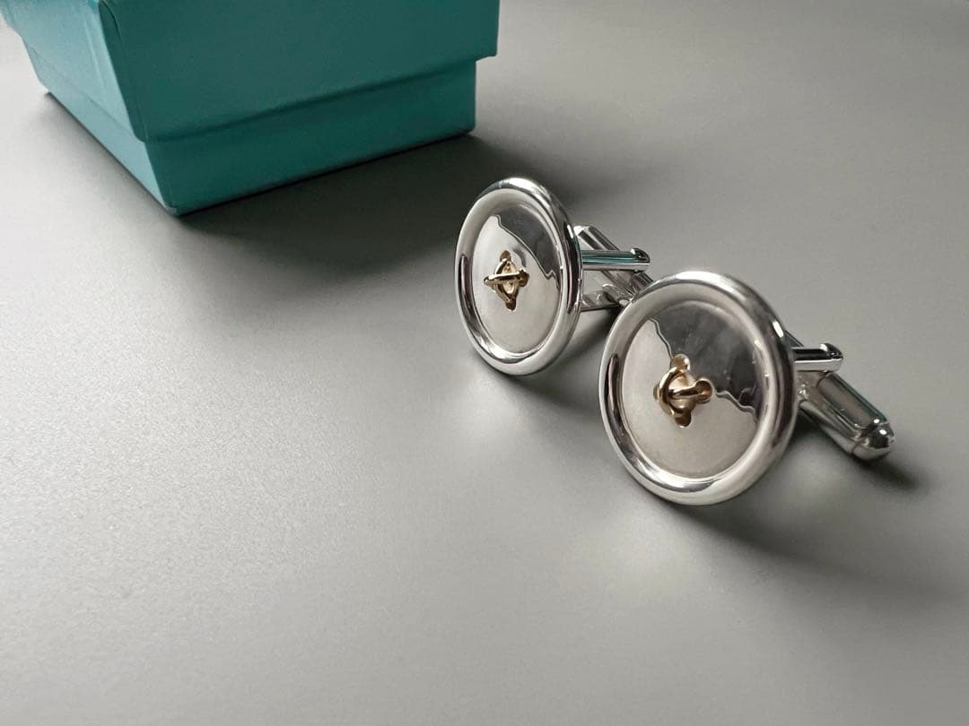 ティファニー ボタンモチーフ カフス コンビ - メルカリ