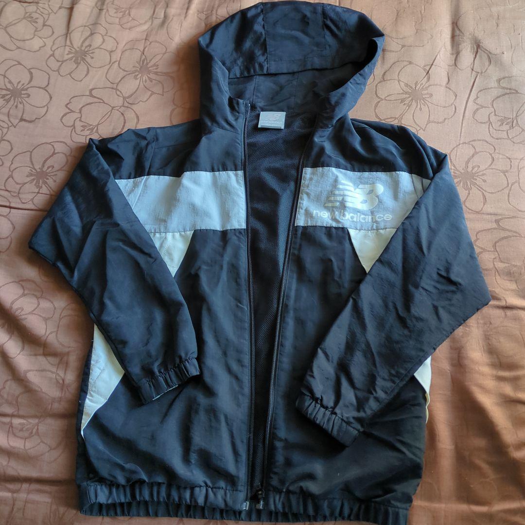 New Balance フード付きナイロンジャケット - メルカリ