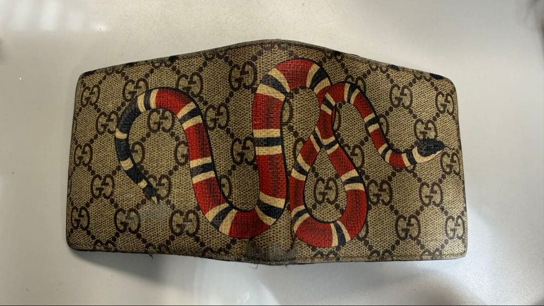 GUCCI】2つ折り財布 蛇柄 - メルカリ
