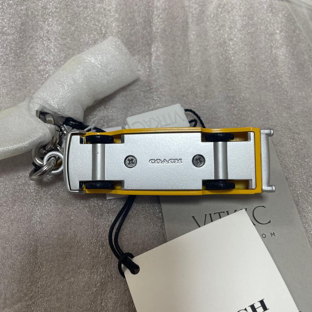 最終値下げ COACH スモール タクシー バッグ チャーム イエローキャブ