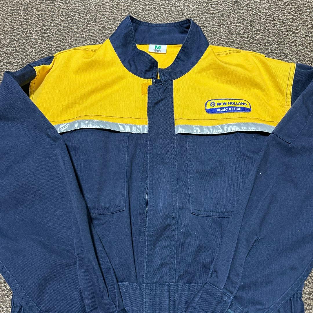 美品！NEW HOLLAND(ニューホランド)つなぎ Mサイズ - メルカリ